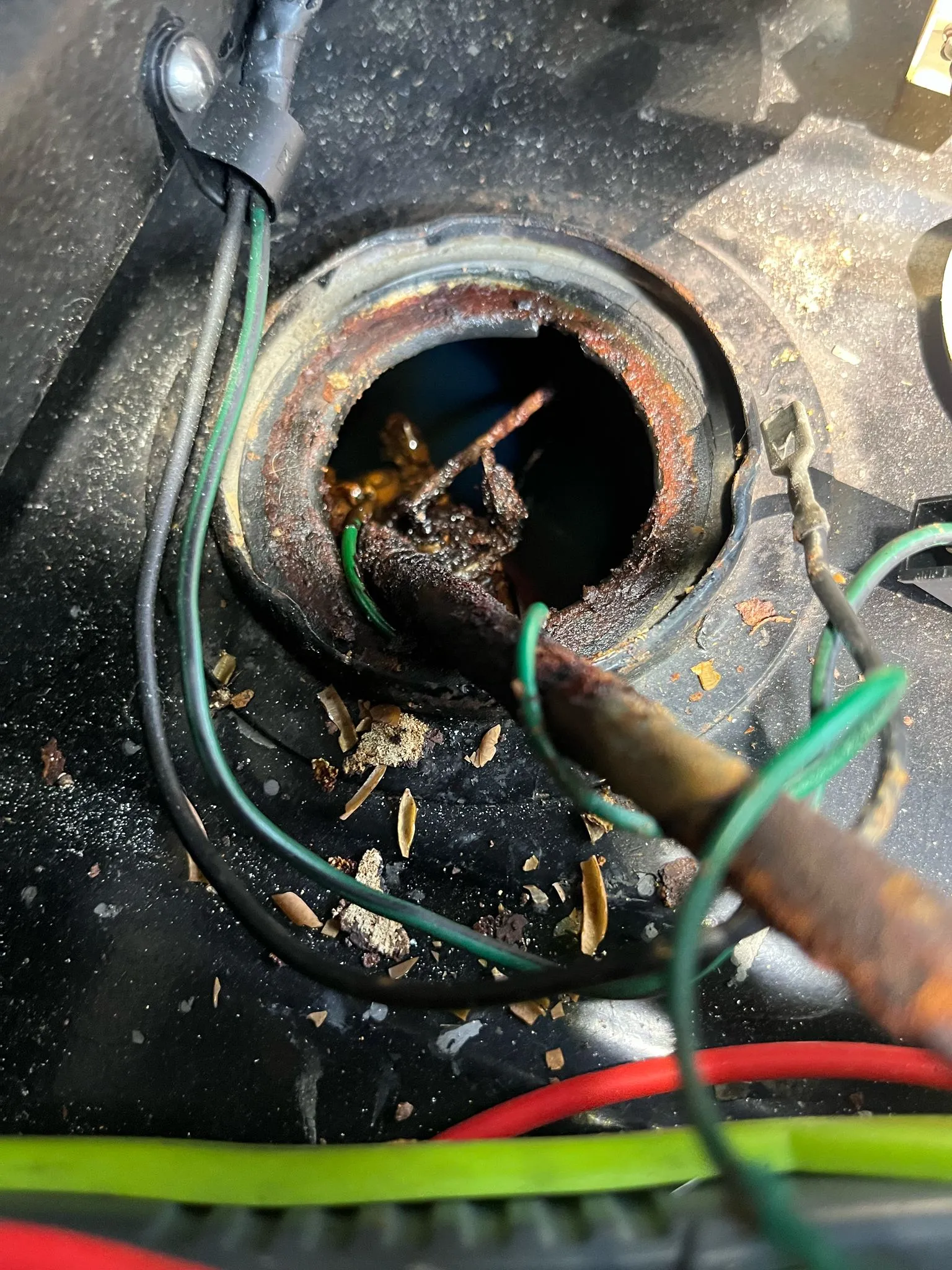 A close up of a metal object with wires.